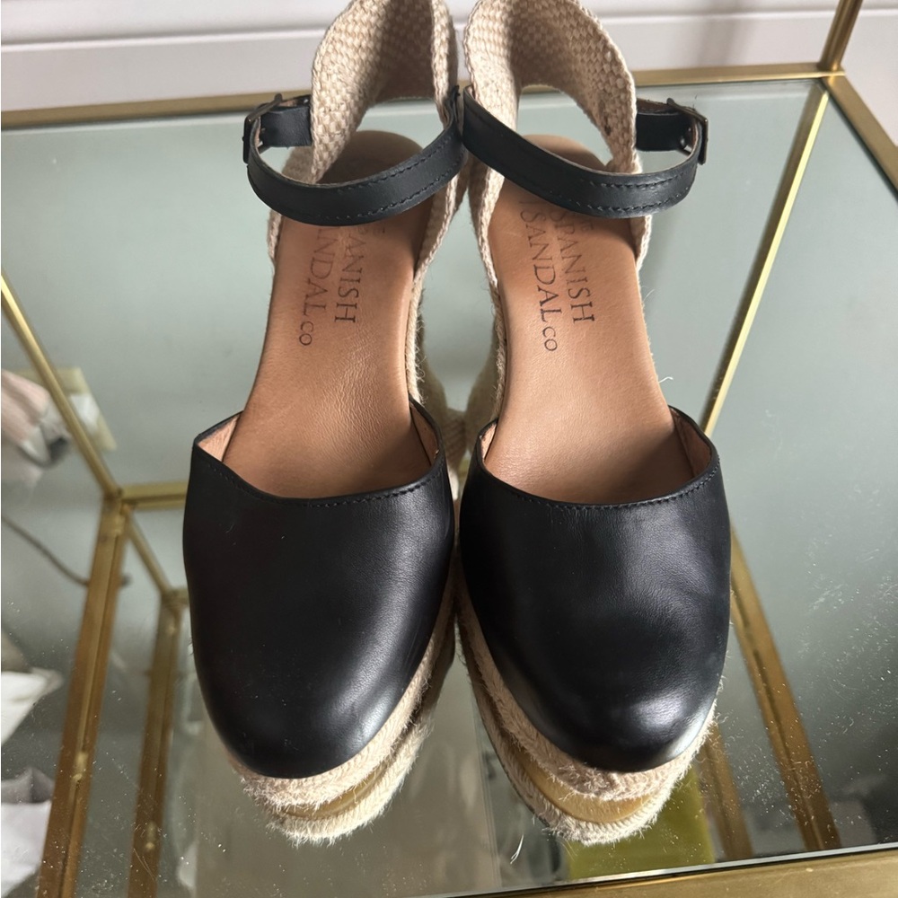 The Spanish Sandal Company wedge espadrille. Black leather upper